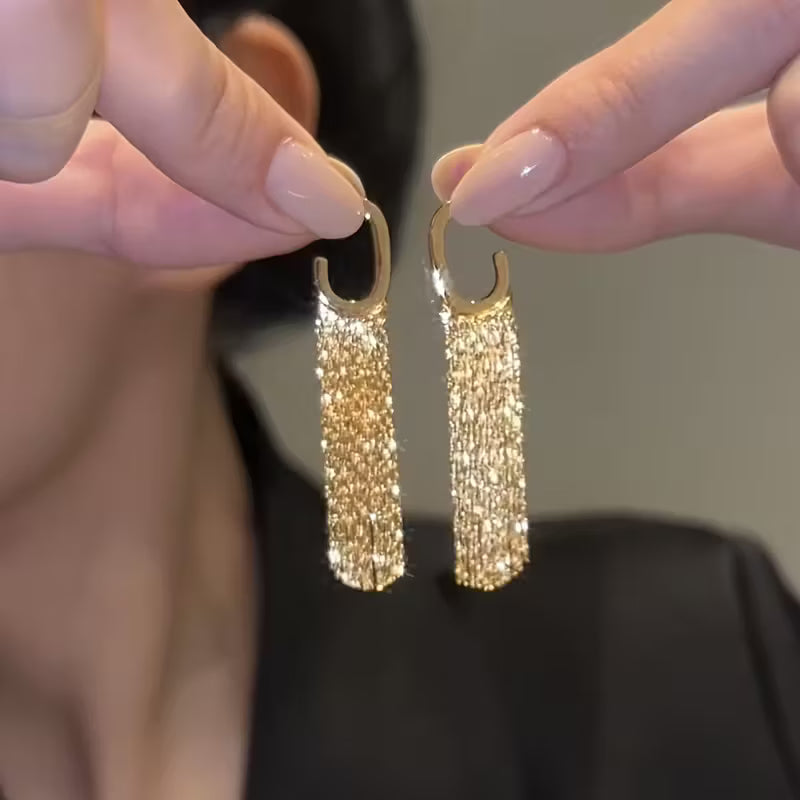 Boucles d’Oreilles Dorées à Glands Géométriques Luxe
