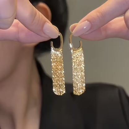 Boucles d’Oreilles Dorées à Glands Géométriques Luxe